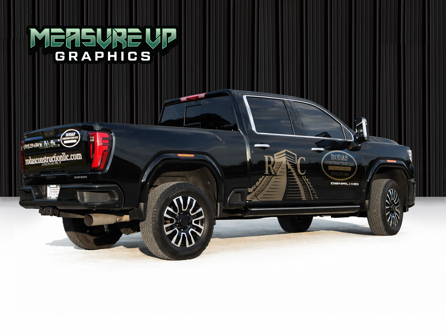 Rodas Construction truck wrap by Measure Up Graphics